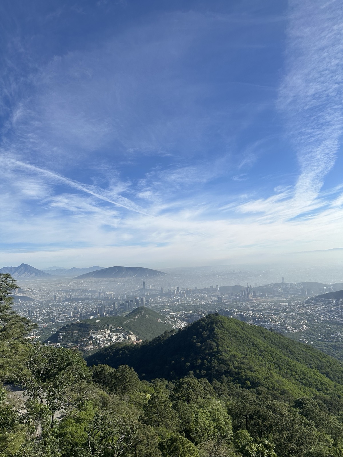 Mountains and the city of Monterrey seen from a hiking trail